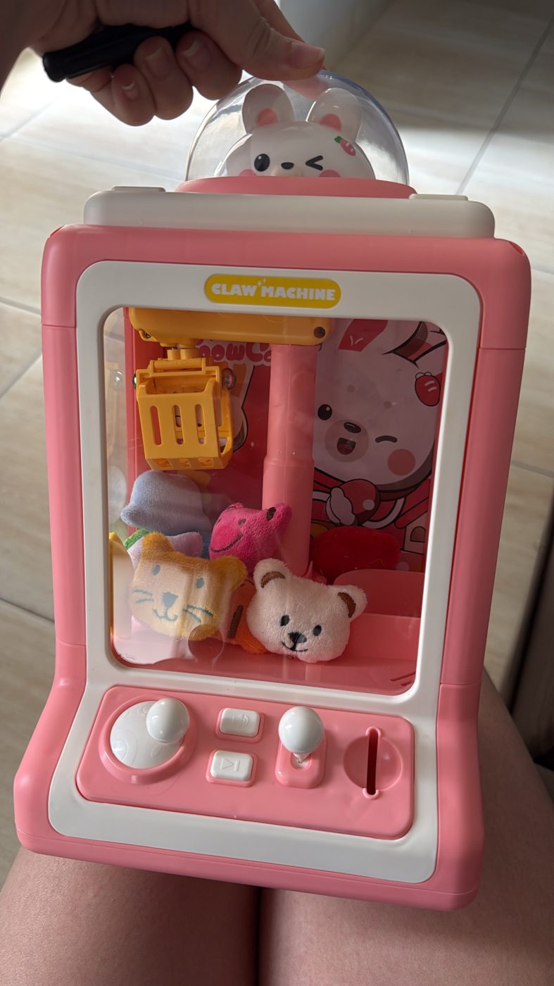 Máquina de garra de brinquedo rosa